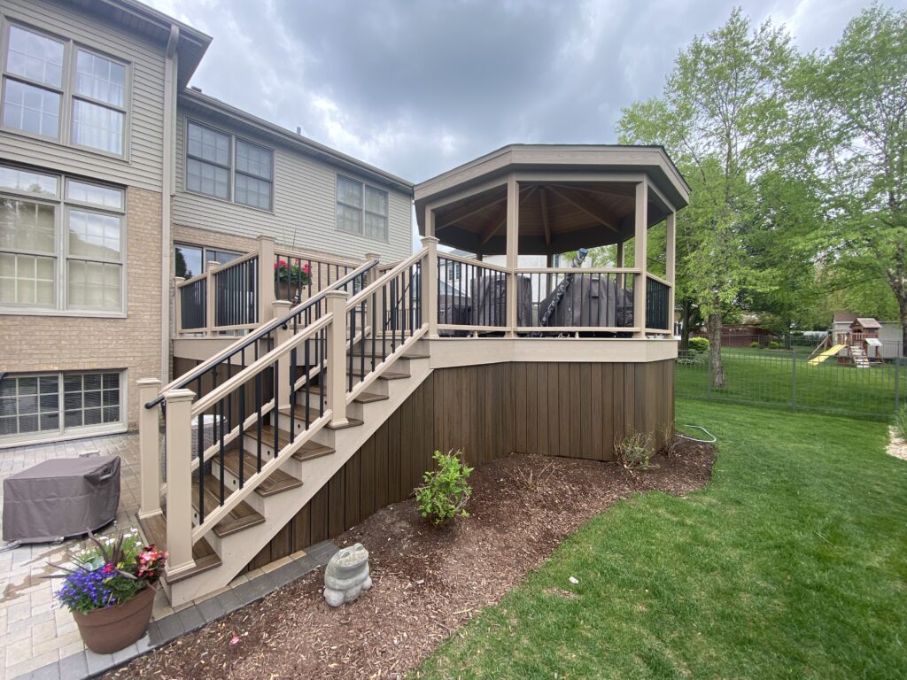 Raised composite deck with a gazebo in Downers Grove IL.